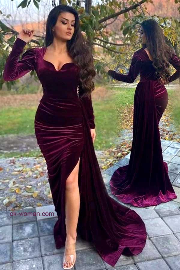 Long sleeve velvet evening dress with side slit.